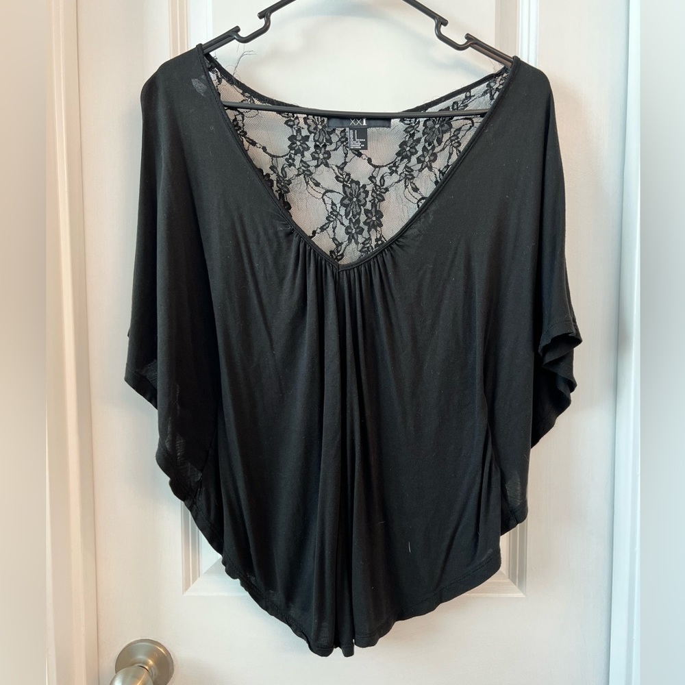 Flowy black shirt with lace accent